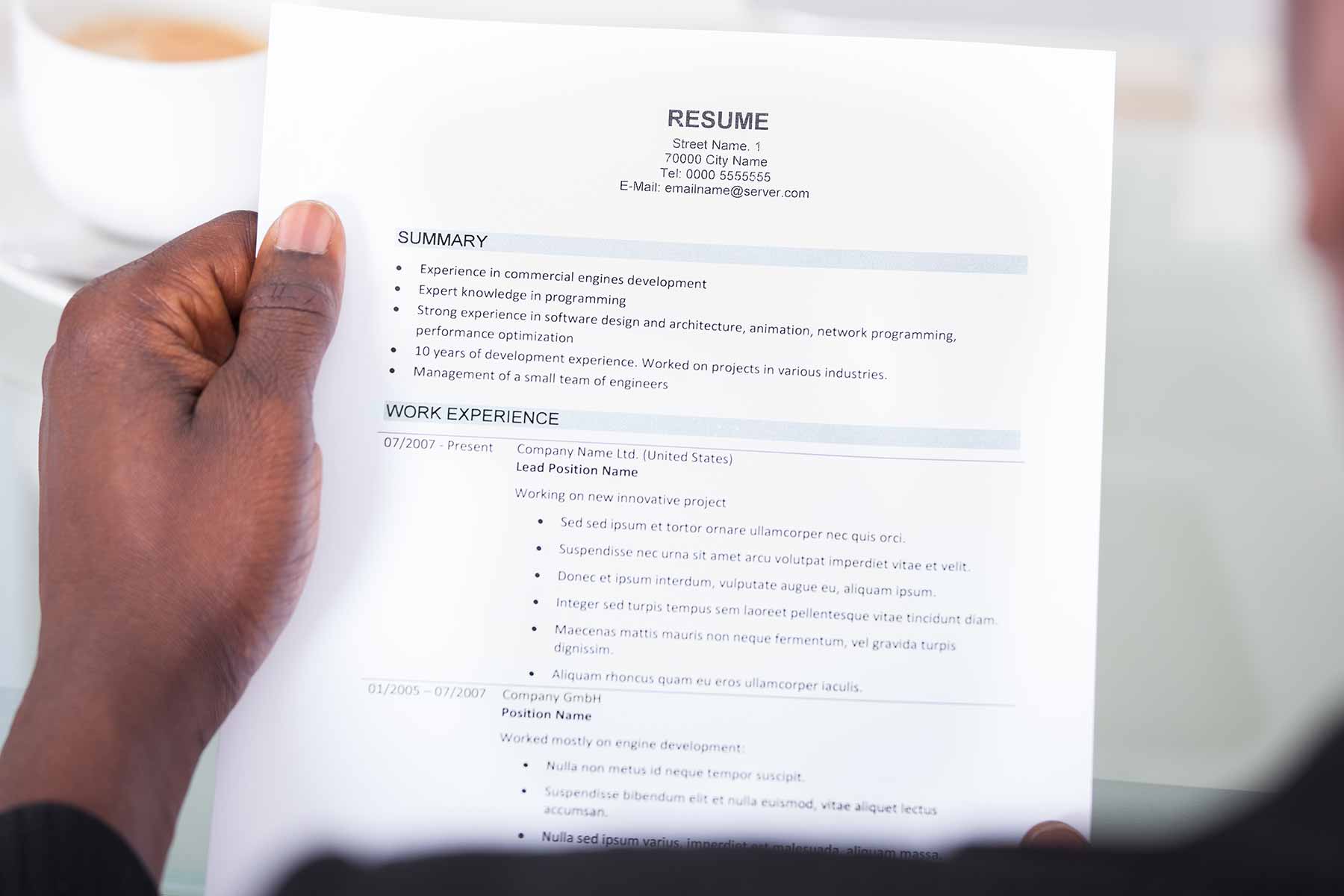 hand holding resume