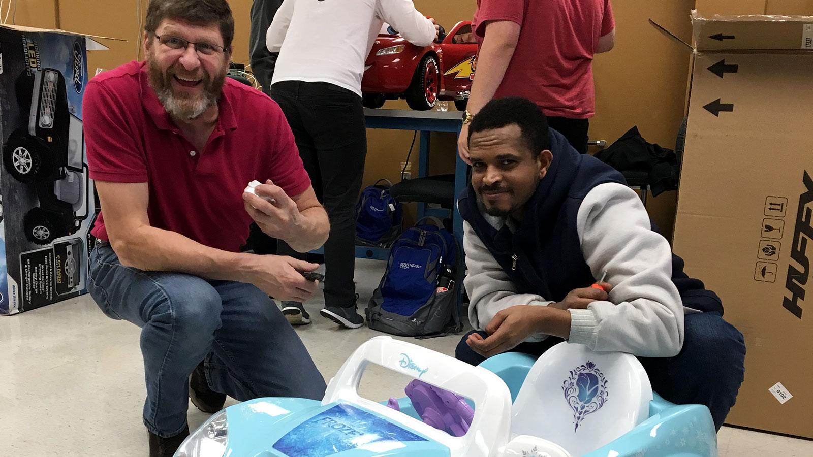 Mechatronics instructor, Bryan Cox and Mechatronics Modifing Ride-On Toy Car for LifeScape