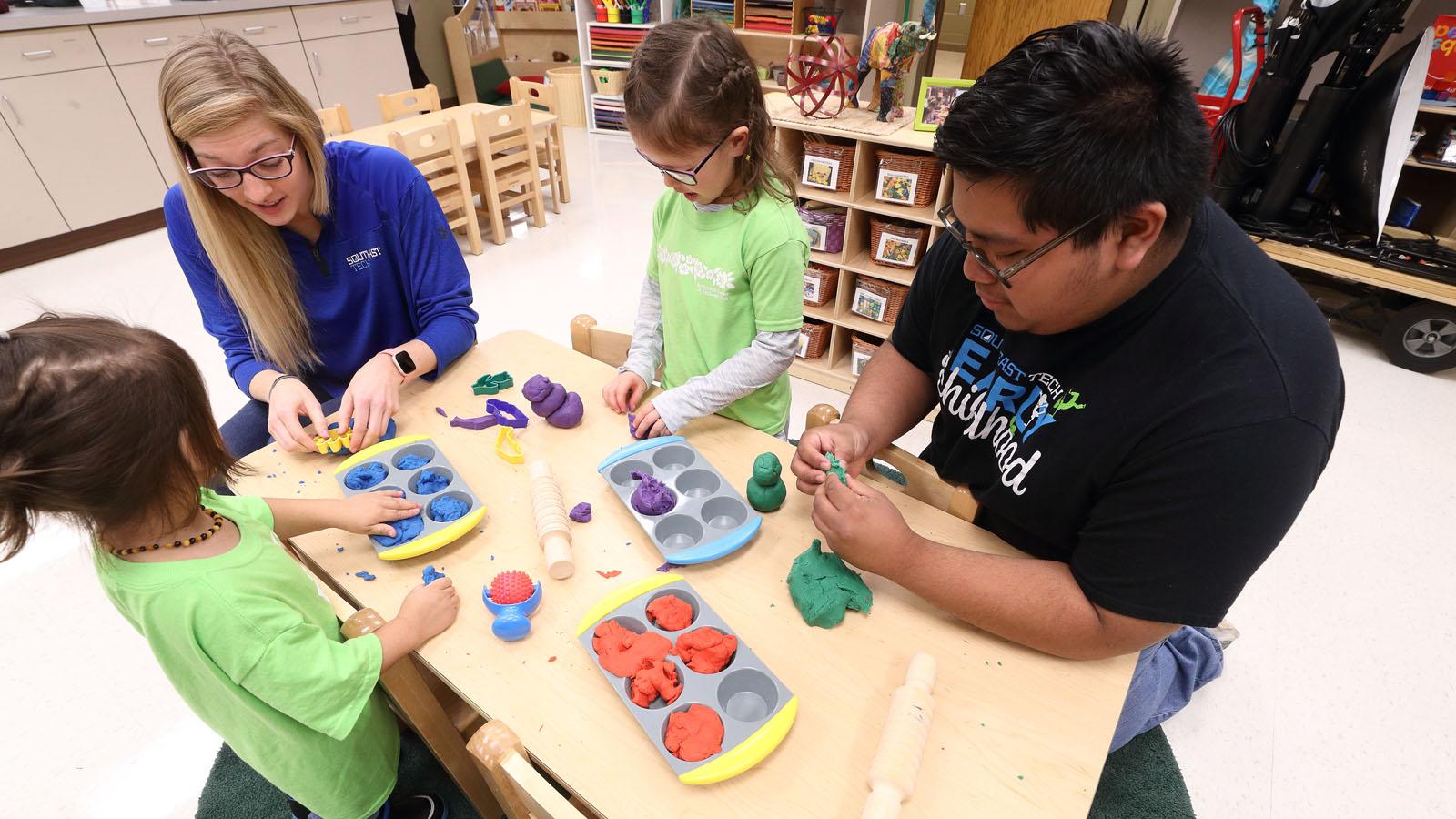 Early Childhood Students Working with Children