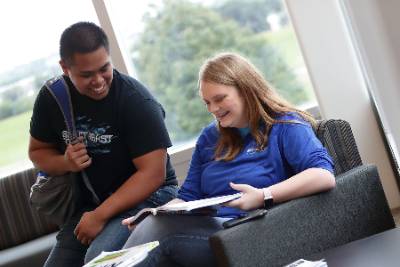 Two students in sunny study area