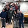 25 recipients of the General Construction stand with their instructor at the Harrisburg CTE ribbon cutting in January 2020.