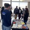 Students viewing table display - Engineering and Construction Management Career Fair