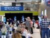 View of large HUB hallway at signing day with podium and stage in background