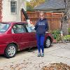 Students and staff volunteer to rake yards as part of Service to Community days. 