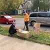 Students and staff volunteer to rake yards as part of Service to Community days. 