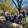 Students and staff volunteer to rake yards as part of Service to Community days. 