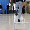 Law Enforcement students use barricades and hurdles for physical training, made by plumbing students. 