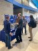 Students and employers visit at career fair in the HUB.