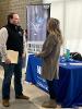 Students and employers visit at career fair in the HUB.