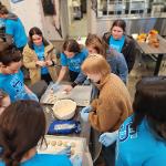 The business programs participated in annual Service to Community (STC) Days by volunteering at the St. Francis House. The group packed lunches, made Halloween items, and stuffed bags with candy.