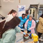 The business programs participated in annual Service to Community (STC) Days by volunteering at the St. Francis House. The group packed lunches, made Halloween items, and stuffed bags with candy.